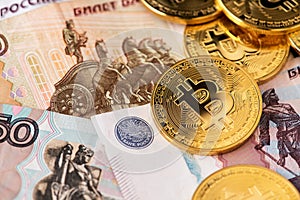 Russian Rubles banknotes and Bitcoin Cryptocurrency.