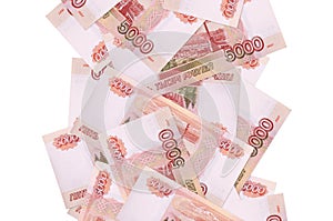 5000 russian rubles bills flying down isolated on white. Many banknotes falling with white copyspace on left and right side