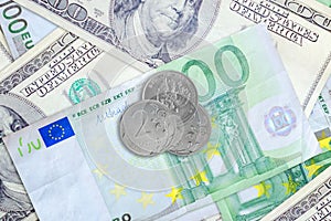 Russian rubles on euro and dollar banknotes. The concept of the rise or fall of the Russian ruble