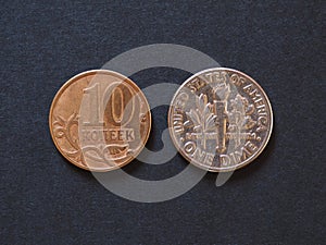 10 Russian rubles kopecks and 10 USD cents coins photo