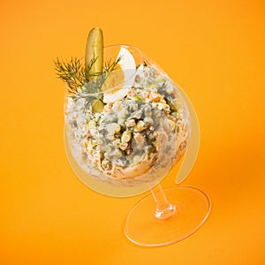 Russian salad in drinking glass