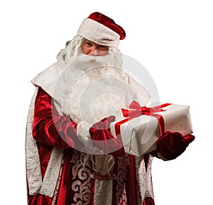 Russian Santa Claus Ded Moroz in a red caftan with a white box of gifts