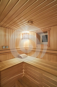 Russian sauna bathhouse with Linden Lining walls and ceiling Abash or African oak bench lanterns hygrometer thermometer