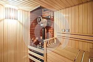 Russian sauna bathhouse with Linden Lining walls and ceiling Abash or African oak bench lanterns hygrometer thermometer