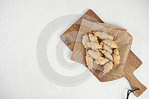 Russian slavic traditional pastry called roguelikes. Cakes bagels. Crispy croissants. Food on white background, Copy space