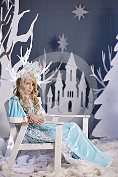 Russian Snow Maiden in blue suit and kokoshnik