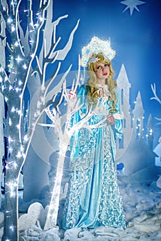 Russian Snow Maiden in blue suit and kokoshnik