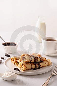 Russian thin pancakes with chocolate.