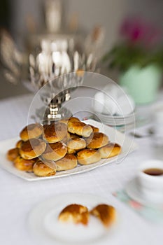 Russian traditional teaparty with samovar and pies or pirozhki with apple jam photo