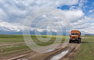 Russian truck Ural crossing a small river