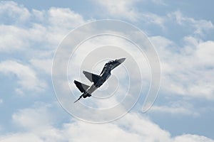 Russian two-seat twin-engine super maneuverable deck-mounted multi-purpose fighter Su-30CM Flanker-C in the sky at  Internationa