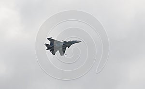 Russian two-seat twin-engine super maneuverable deck-mounted multi-purpose fighter Su-30CM Flanker-C in the sky at  Internationa