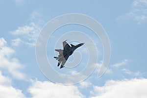 Russian two-seat twin-engine super maneuverable deck-mounted multi-purpose fighter Su-30CM Flanker-C in the sky at  Internationa photo