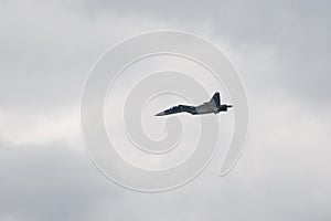 Russian two-seat twin-engine super maneuverable deck-mounted multi-purpose fighter Su-30CM Flanker-C in the sky at  Internationa photo