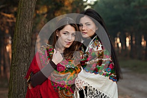 Russian village girls in headscarves in the forest