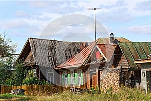 Russian village in summer. Old wooden houses. Village of Visim, Sverdlovsk region, Russia