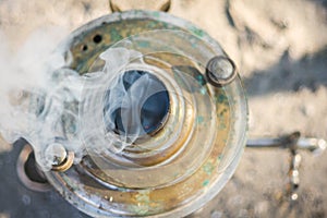 Russian vintage copper samovar with smoke