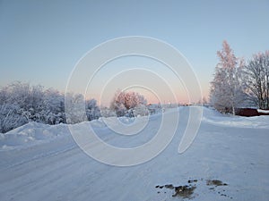 Russian winter, snowy forest, village