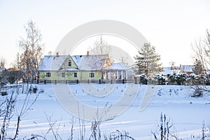 Russian winter village, snow, sun, the central part of Russia