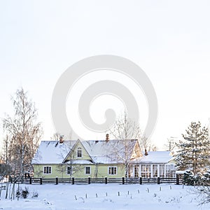 Russian winter village, snow, sun, the central part of Russia