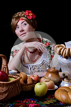 Russian woman drinking tea with samovar