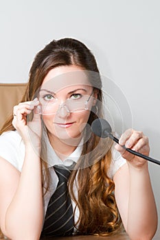 Russian woman manager with speakerphone