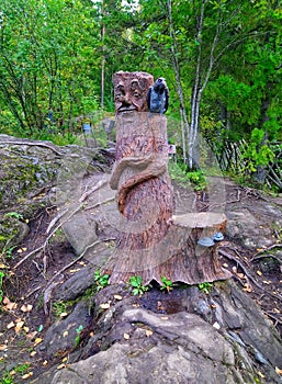 Russian wood spirit with a crow