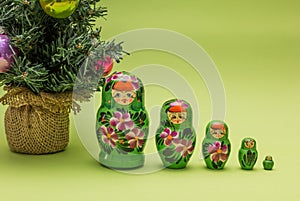 Russian wooden dolls and a Christmas tree