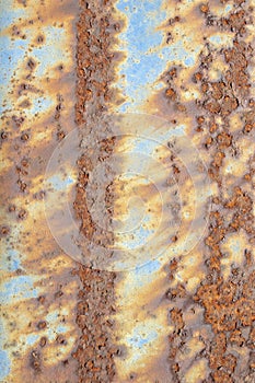 Rust against a blue background