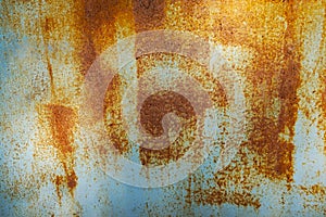 Rust background. Old rusty metal texture. Abstract orange brown blue grunge background.