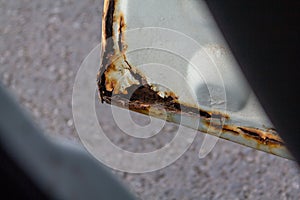 rust build on a car door