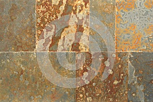 Rust colored square flagstones wall photo