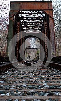 Rust consumes a train bridge