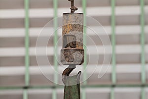 Rust hook with belt in factory