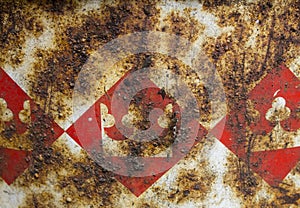 Rust on iron with a pattern.