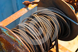 Rust old industry steel cable used aged grunge weathered steel wire or steel rope, rope sling drum