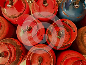 Rust orange and blue LPG tank