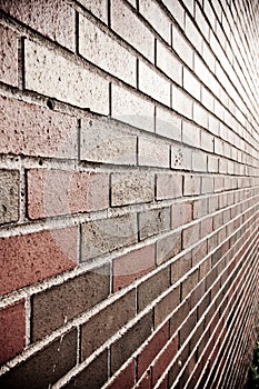 Rust, red and brown brick wall background texture