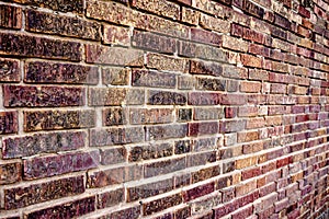 Rust, red and brown brick wall background texture