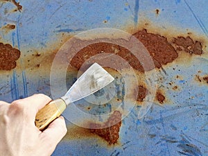 Rust removal with hand photo