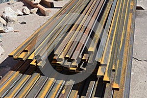 Rust steel beams, iron bar on house construction site outdoor. S