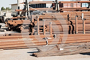Rust steel pipes rack in warehouse