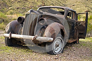 Rusted Abandoned Car in Desert