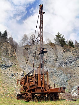 Rusted abandoned mining machine