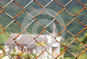 Rusted chain link fence