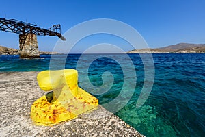 Rusted gantry next to wharf