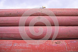 Rusted iron steel metal pipes can be used as an industrial texture background