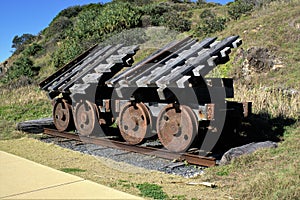 Rusted iron train wheels on railroad track