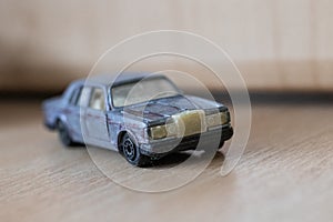 Rusted metal car toy closeup