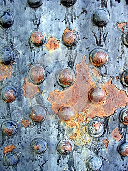 Rusted metal rivets photo